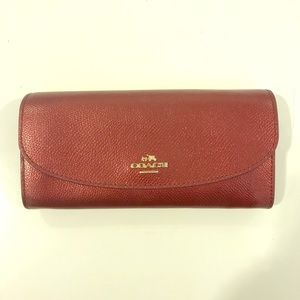 Burgundy coach wallet